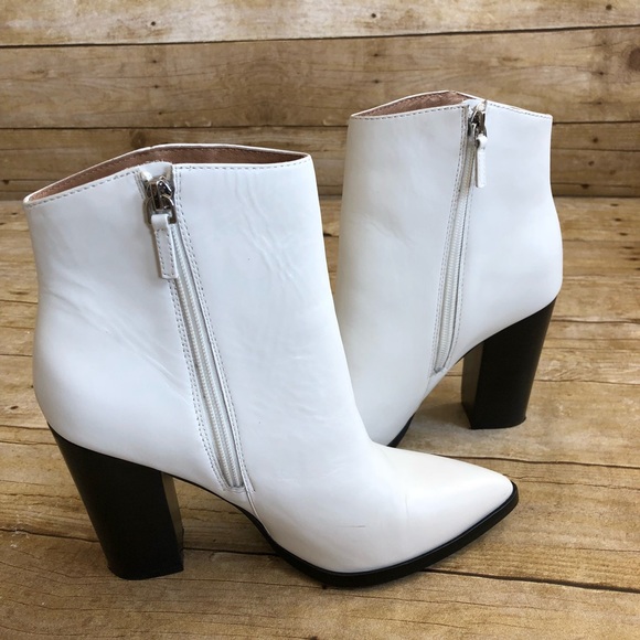 pointed buckle boots